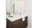 Modern bathroom with a floating vanity and sleek fixtures at 6435 E 6Th Avenue Pkwy, Denver, CO 80220