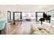 Bright dining room with sliding doors leading to a patio at 6435 E 6Th Avenue Pkwy, Denver, CO 80220