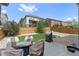 Private backyard with patio and lawn area at 6484 S Harvest St, Aurora, CO 80016