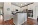 Modern kitchen with stainless steel appliances and island at 6484 S Harvest St, Aurora, CO 80016