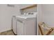 Bright laundry room with washer and dryer, and additional storage at 6484 S Harvest St, Aurora, CO 80016
