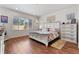 Spacious main bedroom with large bed and plenty of closet space at 6484 S Harvest St, Aurora, CO 80016