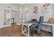 Bright and airy home office with a workspace and built-in storage at 6484 S Harvest St, Aurora, CO 80016