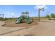 Community playground with play structures at 6484 S Harvest St, Aurora, CO 80016