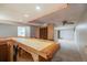 Finished basement featuring a wet bar, carpet flooring, and a open floorplan at 12218 Monroe Dr, Thornton, CO 80241