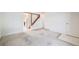 Spacious living room featuring stairs, carpet, and access to the kitchen at 12218 Monroe Dr, Thornton, CO 80241