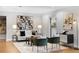 Cozy living area featuring contemporary artwork, elegant decor, and plush seating with a decorative rug at 1590 Little Raven St # 408, Denver, CO 80202