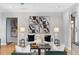 Comfortable living area with stylish decor, contemporary artwork, and plush seating arrangement at 1590 Little Raven St # 408, Denver, CO 80202