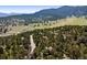 Mountain property located on a secluded street near meadow and trees at 2976 Hiwan Dr, Evergreen, CO 80439