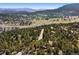 Mountain property located on a secluded street near meadow and trees at 2976 Hiwan Dr, Evergreen, CO 80439