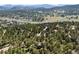 Mountain property nestled in the trees with easy access to the city at 2976 Hiwan Dr, Evergreen, CO 80439