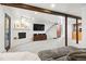 Spacious finished basement featuring carpet flooring, a fireplace, and staircase to the main level at 2976 Hiwan Dr, Evergreen, CO 80439