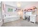 Bedroom with a daybed, desk, white carpet and natural light with pink walls at 2976 Hiwan Dr, Evergreen, CO 80439
