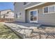 Backyard features concrete patio and gray wood panel siding, perfect for outdoor entertaining at 1169 N Tabor Dr, Castle Rock, CO 80104