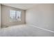 Neutral bedroom features a window that lets in plenty of natural light at 1169 N Tabor Dr, Castle Rock, CO 80104