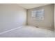 A quiet, neutral room with a window that lets in plenty of natural light at 1169 N Tabor Dr, Castle Rock, CO 80104