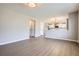 Open-concept floorplan featuring wood-look flooring and lots of space for entertaining at 1169 N Tabor Dr, Castle Rock, CO 80104