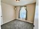 Spacious bedroom with large window and neutral decor at 7982 Larkspur Cir, Frederick, CO 80530