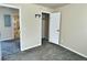 Bedroom with closet and view into another room at 7982 Larkspur Cir, Frederick, CO 80530
