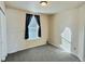 Well-lit bedroom with carpet and window coverings at 7982 Larkspur Cir, Frederick, CO 80530