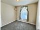 Well-lit bedroom featuring a window and neutral wall colors at 7982 Larkspur Cir, Frederick, CO 80530