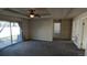 Spacious main bedroom with carpet flooring and sliding door access to the patio at 7982 Larkspur Cir, Frederick, CO 80530