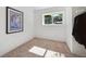 Bedroom with neutral carpet, natural light, and artwork at 9222 Albion St, Thornton, CO 80229