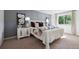Comfortable bedroom with a stylish bed, matching nightstands, and a relaxing ambiance at 9222 Albion St, Thornton, CO 80229