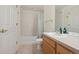 Clean bathroom with a shower-tub combination, a single sink vanity, and neutral finishes at 4385 S Balsam St # 3-101, Littleton, CO 80123