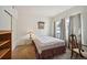 Comfortable bedroom with a window, natural light, and a warm and inviting atmosphere at 4385 S Balsam St # 3-101, Littleton, CO 80123