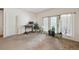 Inviting living room with plush carpeting and large windows, perfect for comfortable and relaxed living at 4385 S Balsam St # 3-101, Littleton, CO 80123