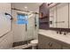 Beautiful bathroom with new glass-enclosed shower and tile floors at 10321 W 101St Pl, Broomfield, CO 80021
