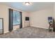 Second bedroom with large window, dresser and play structure at 246 S 22Nd Ave, Brighton, CO 80601