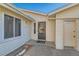 House entrance with a storm door and light fixture at 246 S 22Nd Ave, Brighton, CO 80601