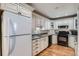 Well-equipped kitchen featuring ample cabinet space and granite countertops at 246 S 22Nd Ave, Brighton, CO 80601