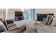 Inviting living room with a fireplace, television, and sliding glass door to the outside at 246 S 22Nd Ave, Brighton, CO 80601