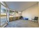 Screened porch with two chairs and a cooler at 246 S 22Nd Ave, Brighton, CO 80601