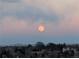 Full moon rising over residential neighborhood at 3131 E Alameda Ave # 2002, Denver, CO 80209