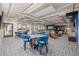 Bright and airy common area with seating and tables at 3131 E Alameda Ave # 2002, Denver, CO 80209