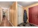 Bright entryway with hardwood floors and coat closet at 3131 E Alameda Ave # 2002, Denver, CO 80209