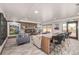 Bright living room with large windows, a fireplace, and modern decor for comfortable living and entertaining at 3131 E Alameda Ave # 2002, Denver, CO 80209