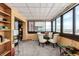 Sunroom with a dining area and panoramic city views at 3131 E Alameda Ave # 2002, Denver, CO 80209