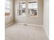 Bedroom with carpet and large windows overlooking the neighborhood, providing natural light at 39751 Congress Ln, Elizabeth, CO 80107