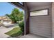 View from the entryway; highlights include lots of natural light, manicured landscaping, and neighborhood views at 11186 E Baltic Dr, Aurora, CO 80014