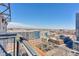 Balcony view of city skyline from a high-rise building featuring several buildings and clear blue sky at 2020 Arapahoe St # 1250, Denver, CO 80205