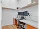 Dedicated office space features a built-in desk, shelving, and natural light at 2020 Arapahoe St # 1250, Denver, CO 80205