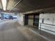 Interior view of the parking garage with elevator access, featuring secure and convenient parking at 2020 Arapahoe St # 1250, Denver, CO 80205