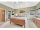 Comfortable main bedroom with outdoor access and stylish furniture at 1590 S Milwaukee St, Denver, CO 80210