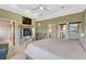 Lovely main bedroom featuring a fireplace and access to a private balcony at 1590 S Milwaukee St, Denver, CO 80210