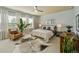 Spacious bedroom featuring ample natural light, neutral tones, and stylish decor at 817 Uinta Way, Denver, CO 80230